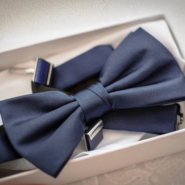 Knotted blue bow tie
